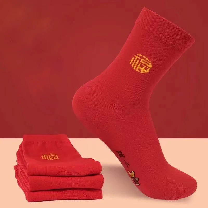 

Women's socks are comfortable and warm in autumn and winter with red middle tube socks that are festive bright funny socks