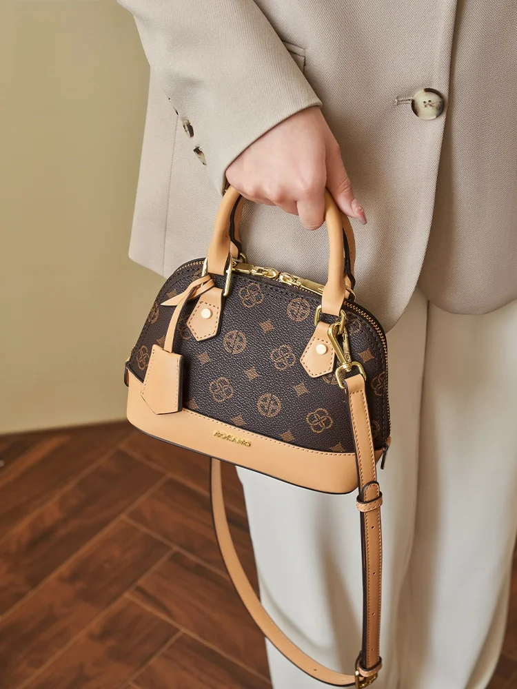 

Aokang ell Handbag 2025 New Faion Large Capaci Women's Handbag Vintage Artistic Sle Commuting Single oulder Bag