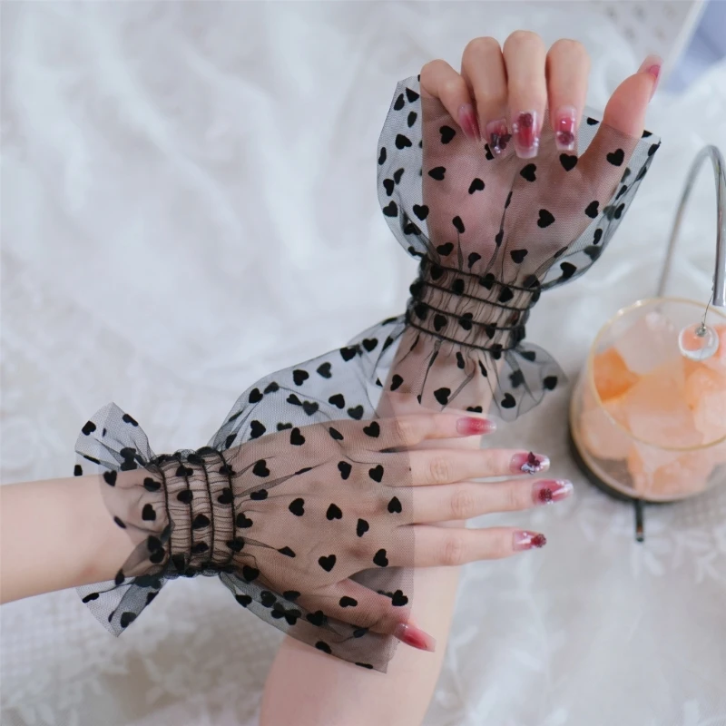 Elegant Lace Wrist Cuffs with Heart Design - usage example