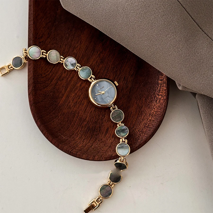 

НОВЫЕ женские часы в стиле ретро с глубоководным корпусом и круглым браслетом, высококачественный нишевый маленький циферблат, в сочетании с платьем, изысканный подарок