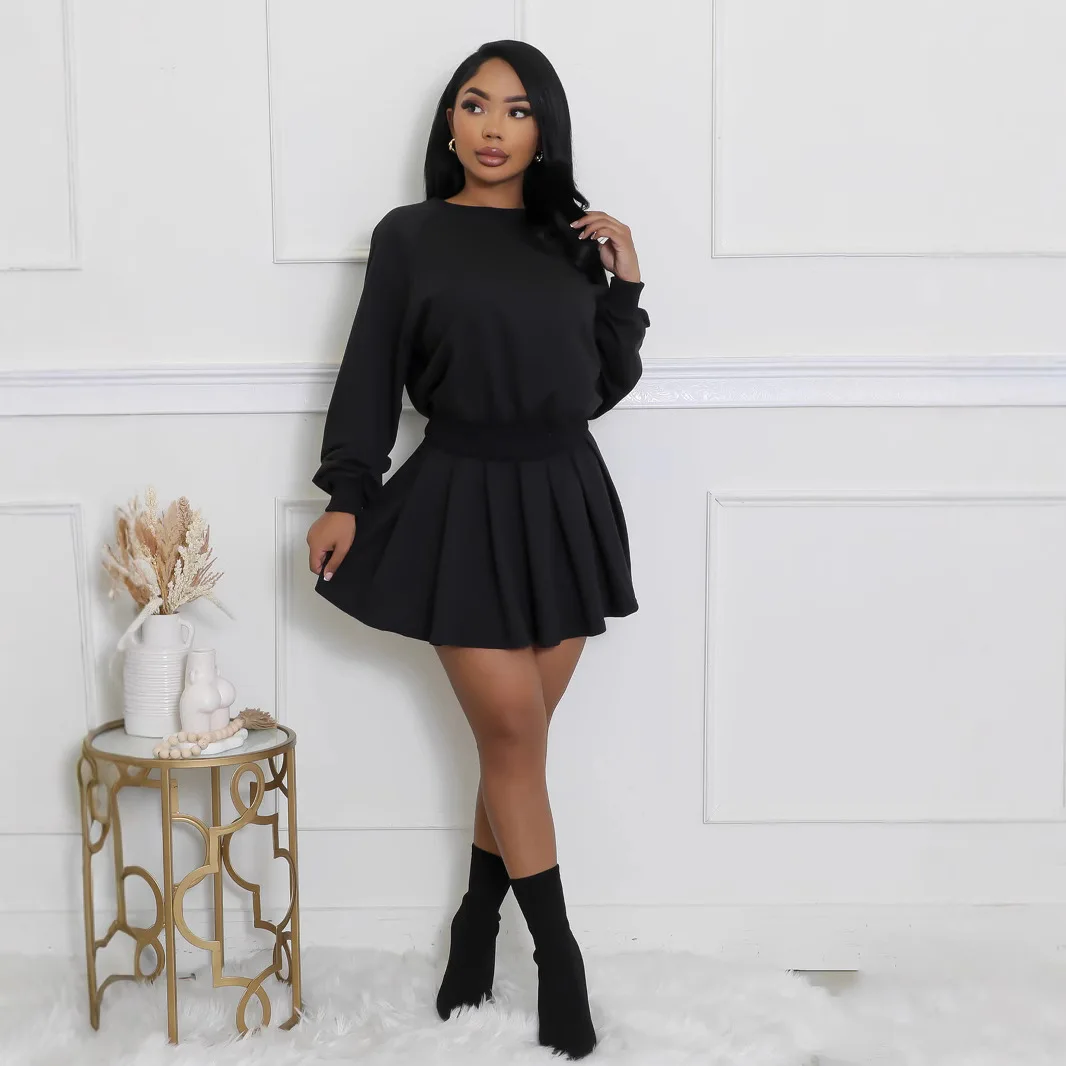 Custom LOGO European and American women\'s clothing new two-piece casual long-sleeved jumper top pleated mini skirt