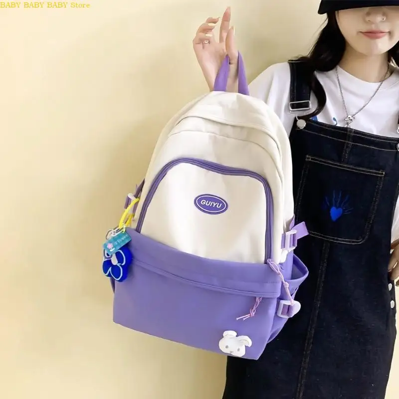 

Q81A Backpack with Pendant Nylon School Bag for College Teenagers Youth Rucksack Student Casual Daypack Female Bookbag