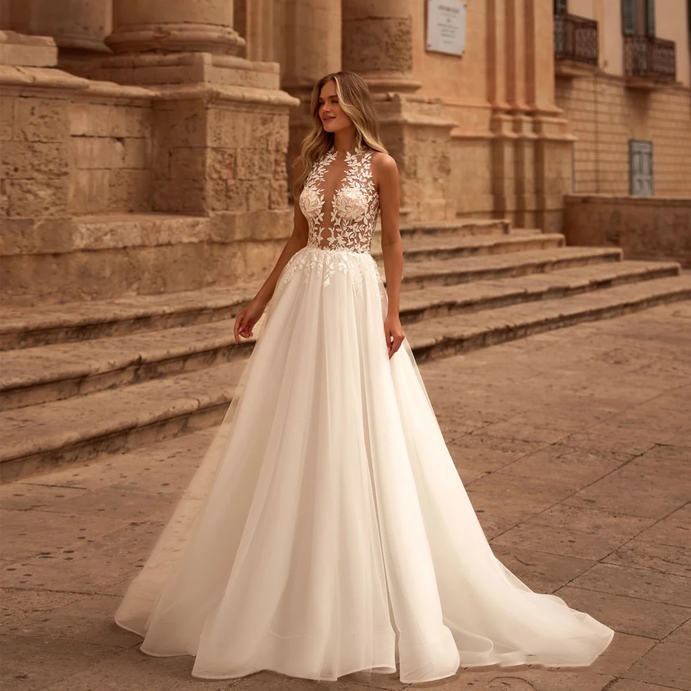 

Sexy Boho Wedding Dresses Sleeveless Bride Dresses O-Neck See Through Lace Applique Backless A-Line Beach Bridal Gown Customized