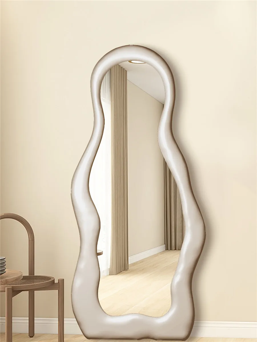 Floor to ceiling full-length dressing mirror for irregular home use, artistic wall mounted wooden fitting mirror against the wal