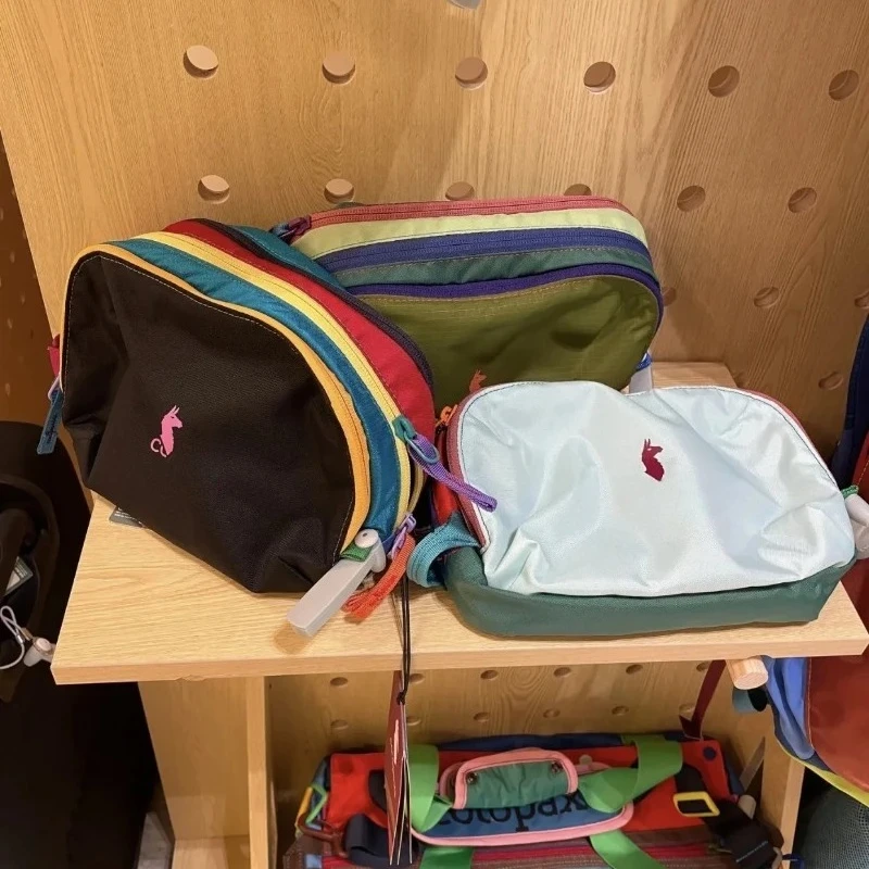 

2025 Niche New Dopamine Waterproof Nylon Cosmétique De Lavage De Voyage Bag Storage Bag Casual Sports BAGS