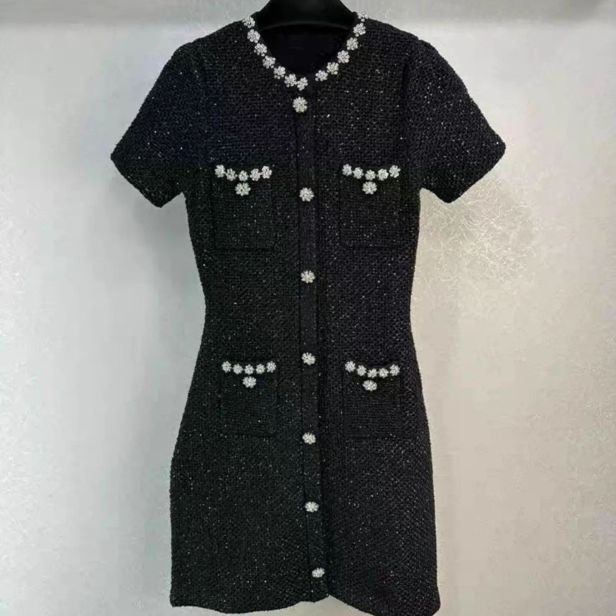 

Women Sequin slim fitting black single breasted short sleeved knitted mini dress