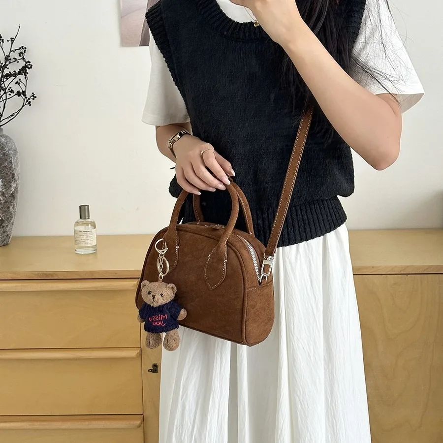 

Korean version of the fashion retro hardcover suede ancient handbag large capacity single shoulder crossbody female bowling bag