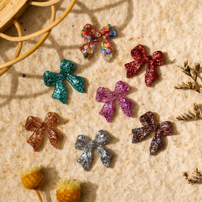 50 stücke Glitter Gemischte Farbe Bogen Nagel Charms 3D Kawaii Glänzende Pailletten Bögen Nagel Dekoration DIY Design Nagel Zubehör 11*12mm
