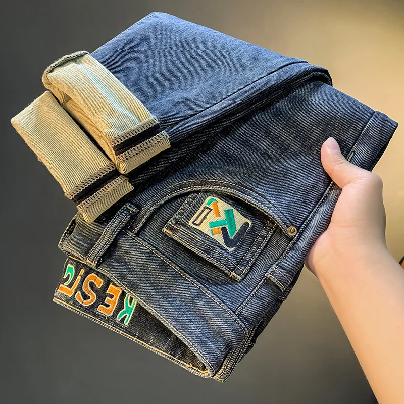 

2025 new jeans men's slim fit elastic small leg pants casual versatile slimming trend embroidered printed pants