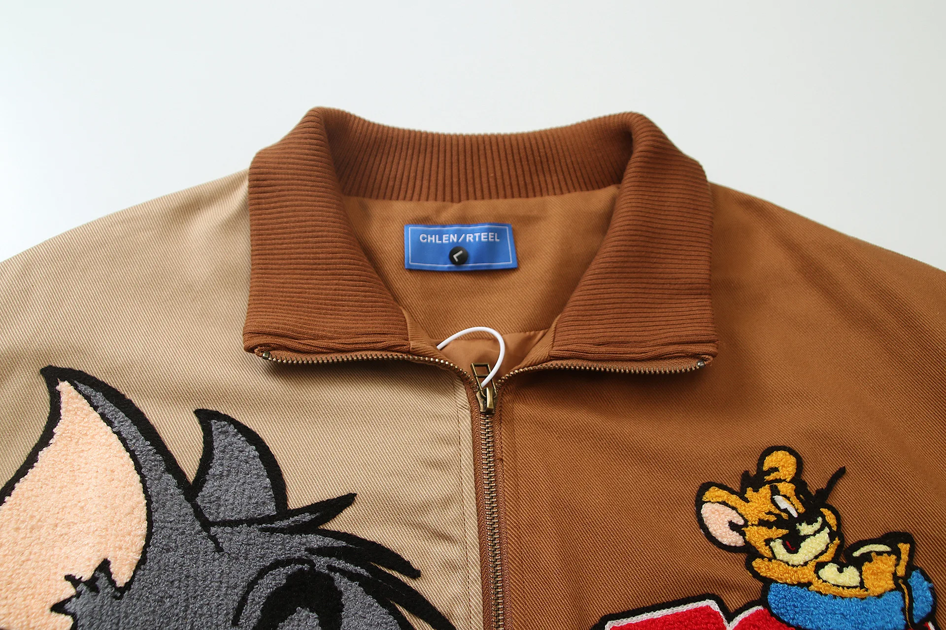 Amerykańska kurtka w stylu retro z haftem, kolorowymi blokami i klapami, unisex, luźny krój BF, casual