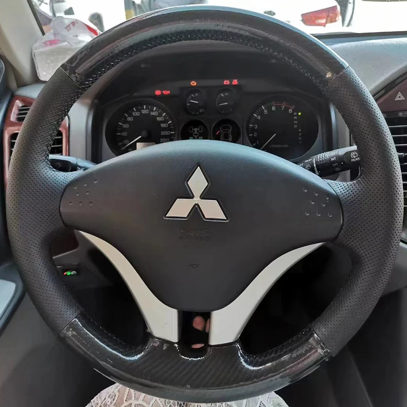 

Прошитая вручную Нескользящая натуральная кожа из углеродного волокна для Mitsubishi Pajero 2008-2011 V73 L200 2011