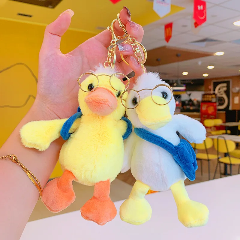 Animais de pelúcia Chaveiro de pelúcia Óculos fofos Brinquedos de boneca de pato Pingente de mochila Saco Keychain Acessórios de livros Saco de livro