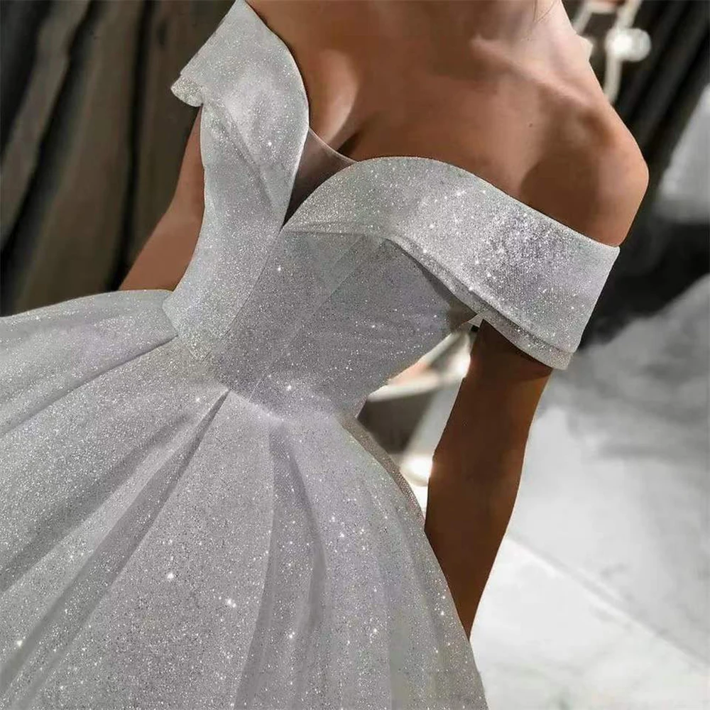 Abito da sposa in tulle luccicante con spalle scoperte Scollo a V con lacci Soffice strascico a spazzola Foto reali personalizzate di lusso Abiti da sposa brillanti