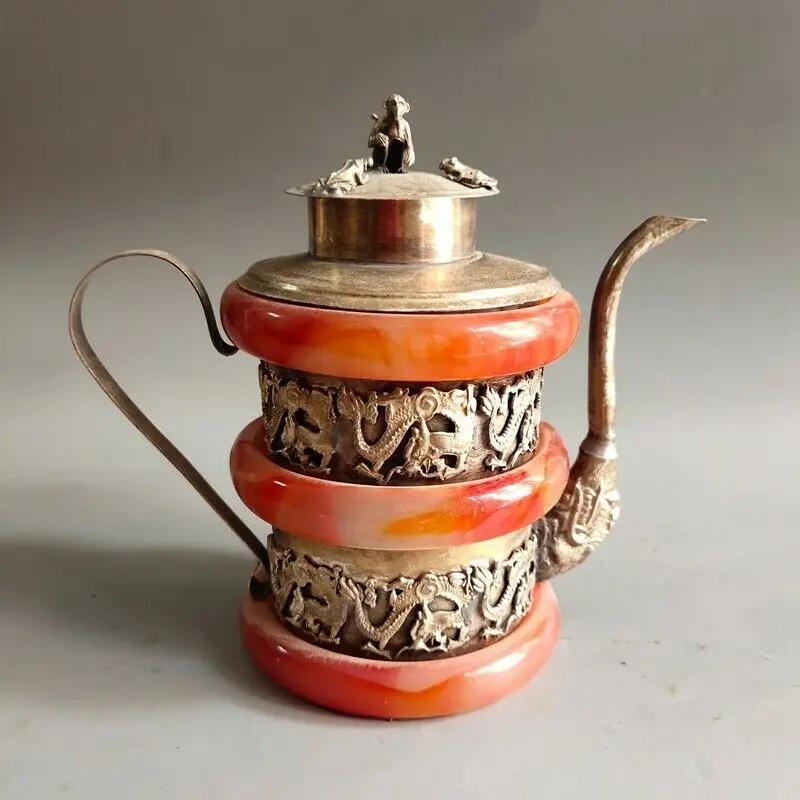 

Old Chinese tibet silver inlay red jade handcarved dragon pots wine pot