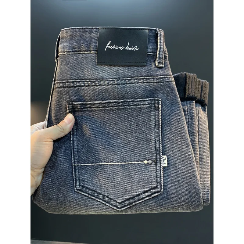 2025 خريف جديد الراقية الدخان الرمادي الجينز الرجال العلامة التجارية العصرية مرونة فضفاضة تظهر رقيقة مستقيم أنبوب السراويل الطويلة