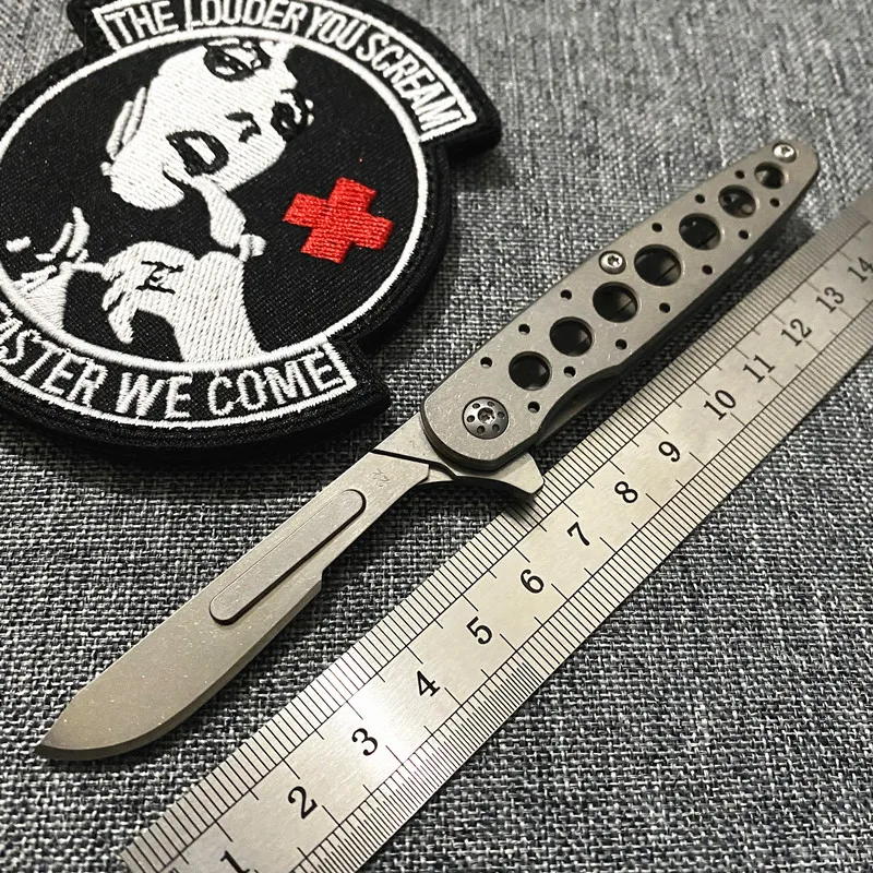 

Hollow titanium alloy paper cutter utility knife unpacking quick opening folding knife EDC