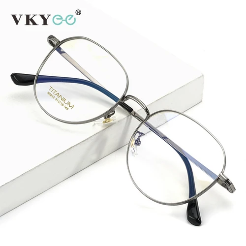 Imagen 1 del producto VICKY Simple moda marco grande diseño de titanio mujeres Anti-luz azul gafas de lectura hombres prescripción personalizada 02-K5012