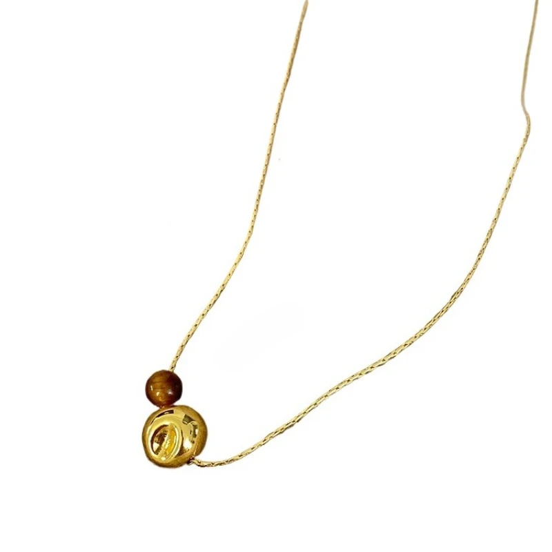 

Liquid geometric ball tiger's eye stone snake bone chain necklace autumn and winter sweater chain