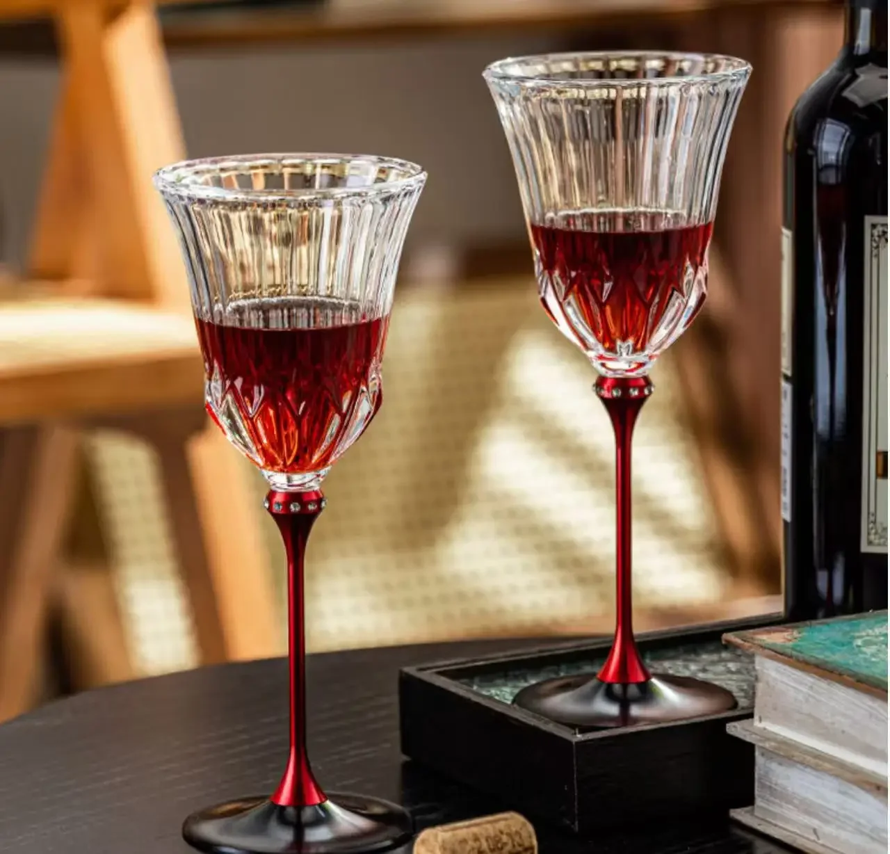 Vintage carved crystal red wine glass with red and black high stem inlaid with diamonds, designed for home use