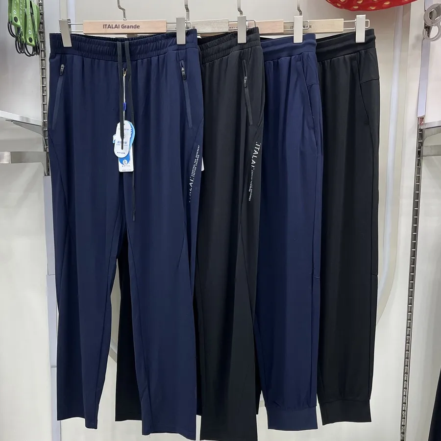 pantaloni-lunghi-e-sottili-in-cotone-effetto-ghiaccio-modello-ampio-e-casual-con-gamba-dritta-e-risvolto-per-uomo-e-donna-collezione-primavera-2024-per-il-tempo-libero-a-casa