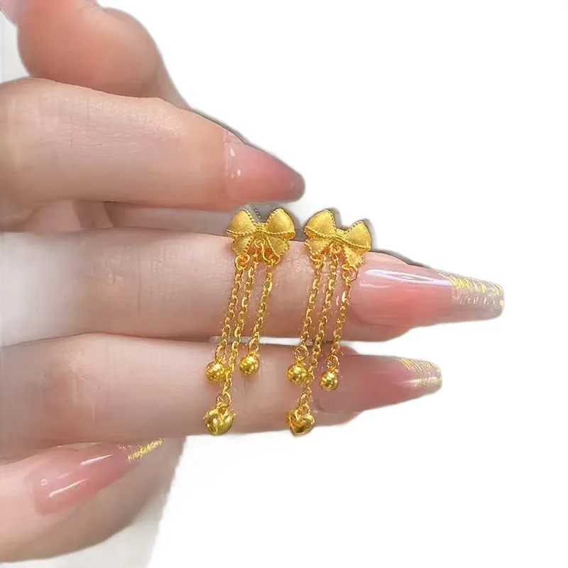 New Chinese style bow tassel earrings female retro sweet all build light luxury temperament senior sense 9999gold