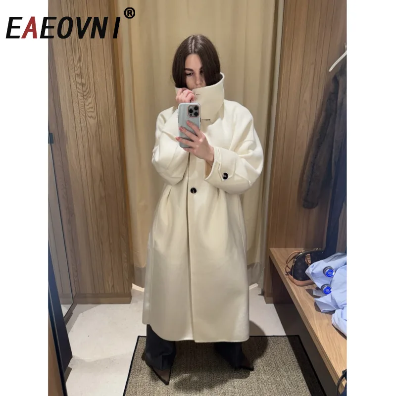

EAEOVNI модное шерстяное длинное пальто для женщин, однотонное темпераментное пальто с воротником-стойкой и пуговицами, офисная женская куртка 2026, новая одежда