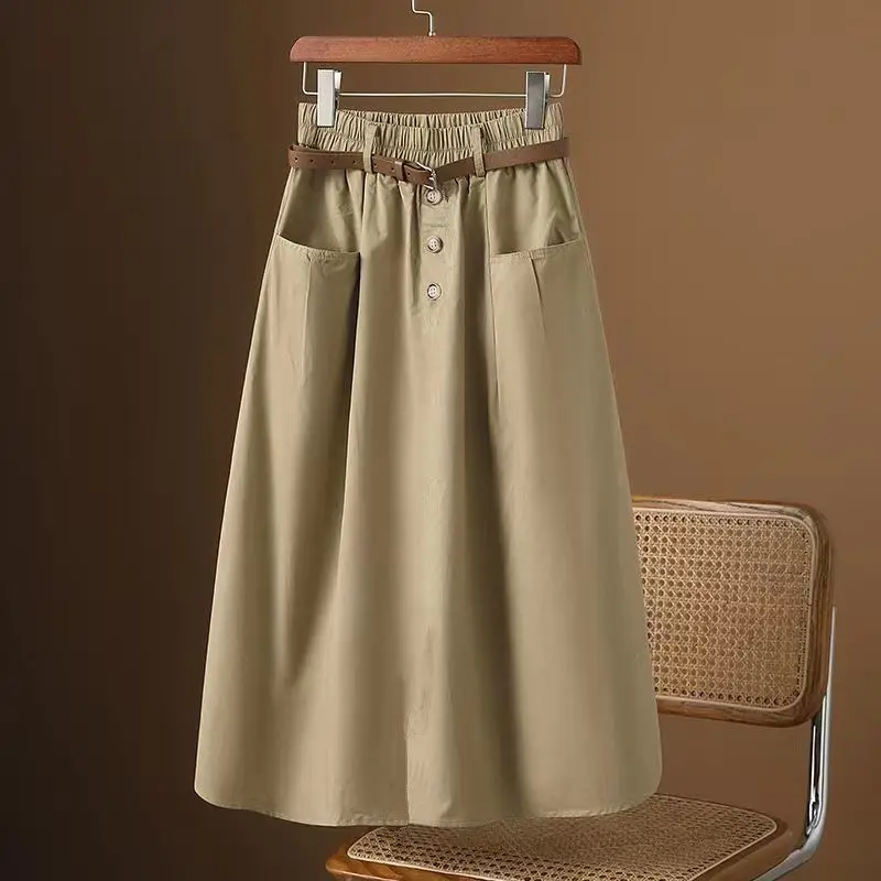High Waist Elastic Waist Skirt Women's 2026 New Korean Style Slimming Pocket Workwear Midi Skirt Standard Fit Commute Style