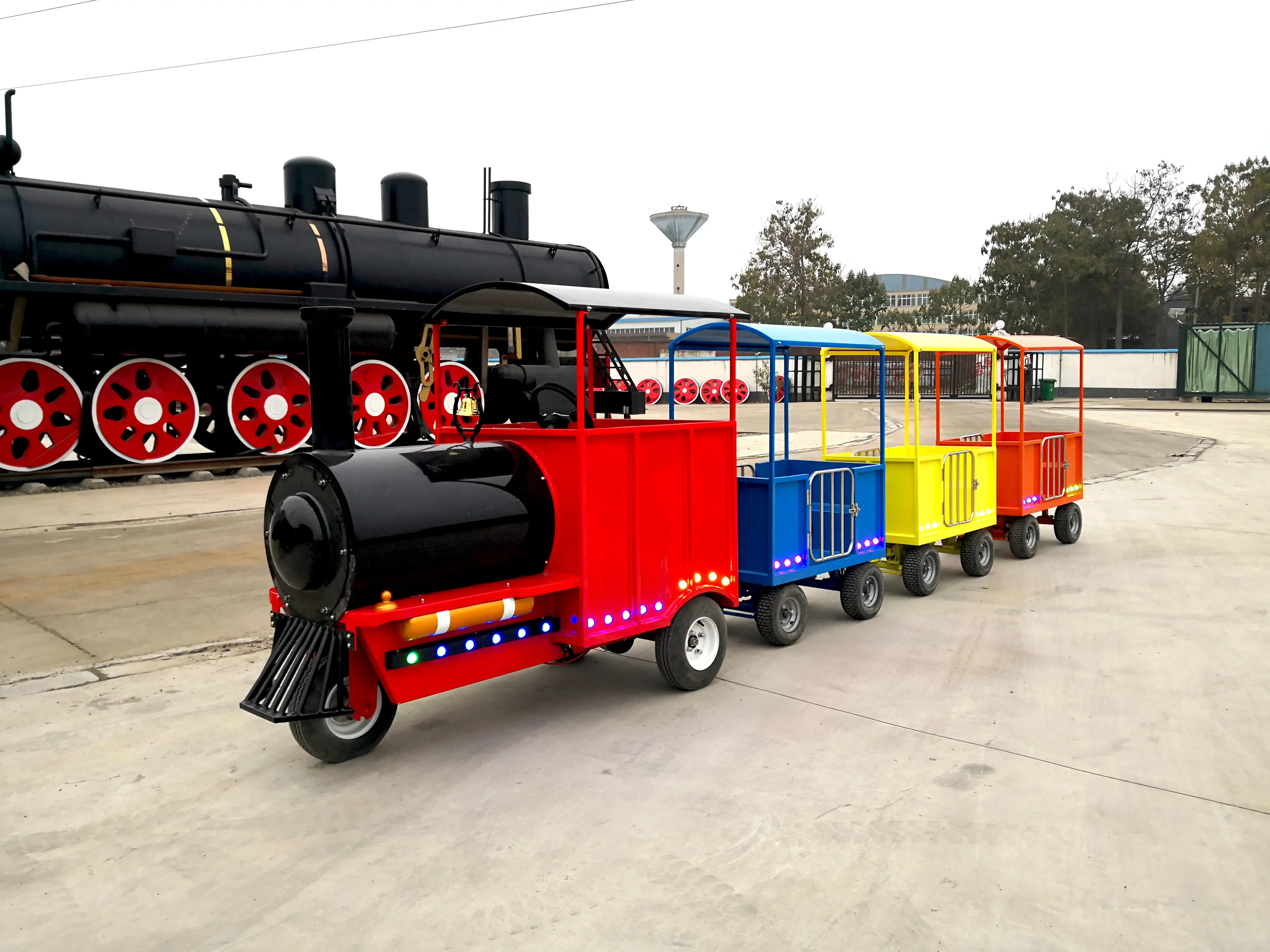 Customized ride on children's electric amusement trains