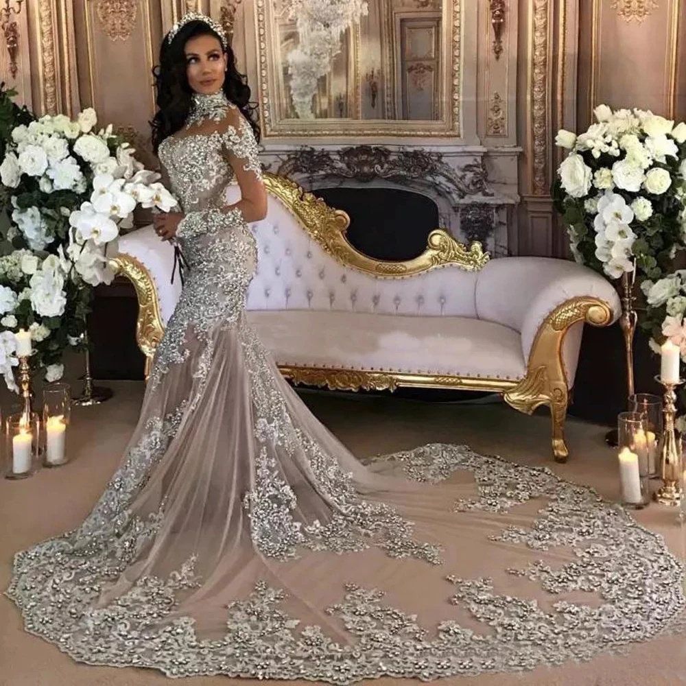 Dubai Arabic Luxury Sparkly Wedding Dresses Sexy Bling Beaded Lace Applique High Neck Illusion Long Sleeves Mermaid Bridal Dress