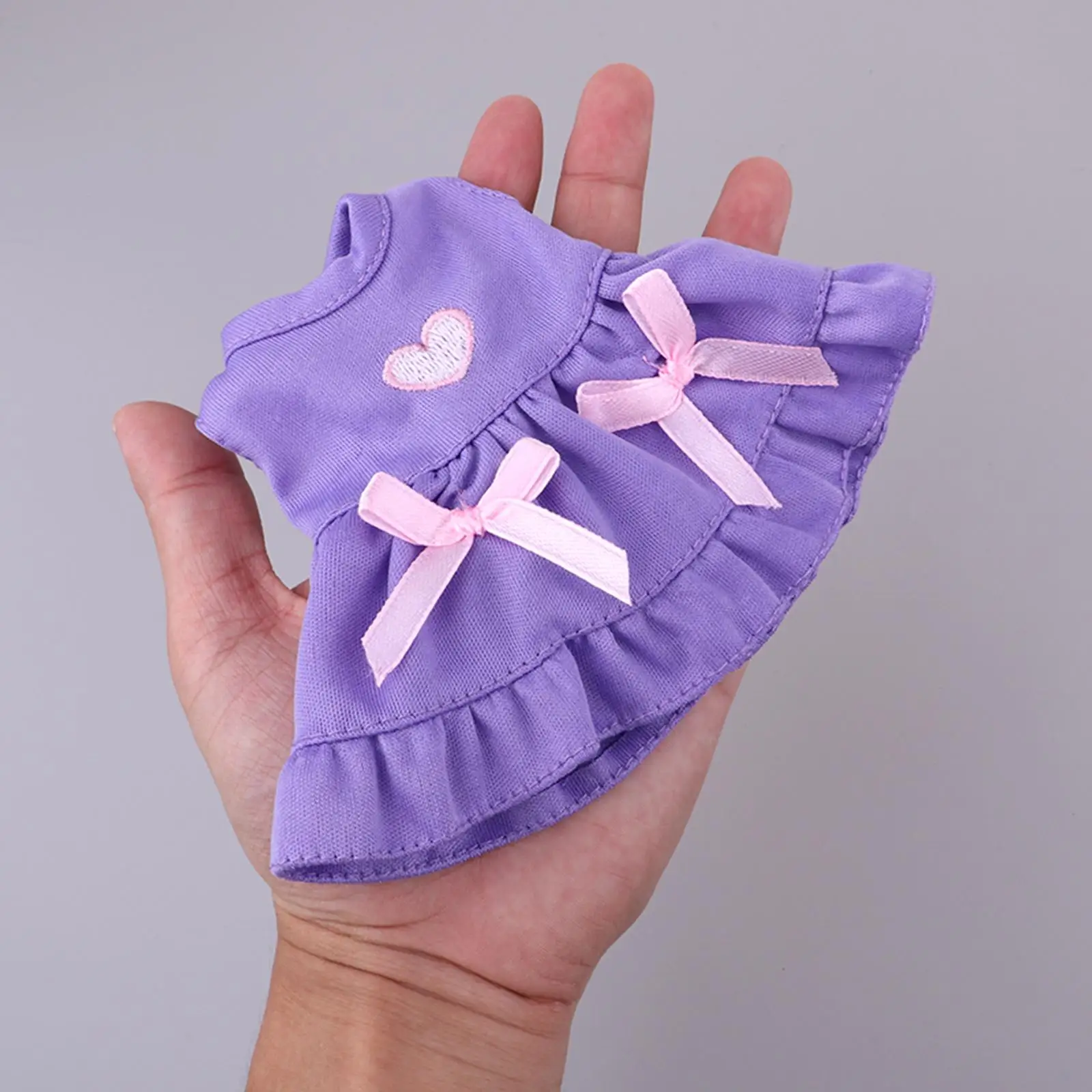 Spódniczka z kokardą, akcesoria dla lalek z nakryciem głowy, pasujące do lalek o wysokości 25 cm.