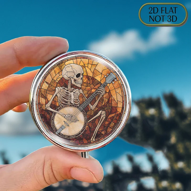 Single-piece flat portable round metal pill box, decorated with a skull playing a banjo, suitable for organizing daily medication, can also be used to store vitamins and small items, is a perfect gift in L size, with a flat design
