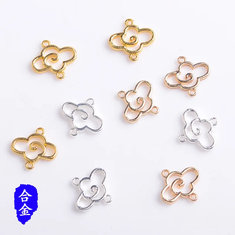 New antique hollow auspicious cloud up and down connection alloy pendant DIY handmade forbidden tassel material spot wholesale