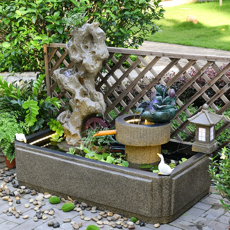Outdoor balcony circulating water system flowing water ornament stone grinding courtyard water feature fish tank imitation stone