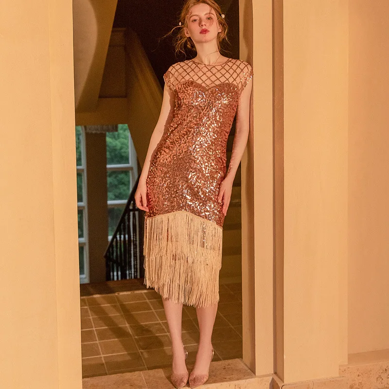 Abito femminile sexy con frange di paillettes O-Collo senza maniche Vedi attraverso la maglia aderente Abito con nappe stanche Abito da banchetto per feste con glitter