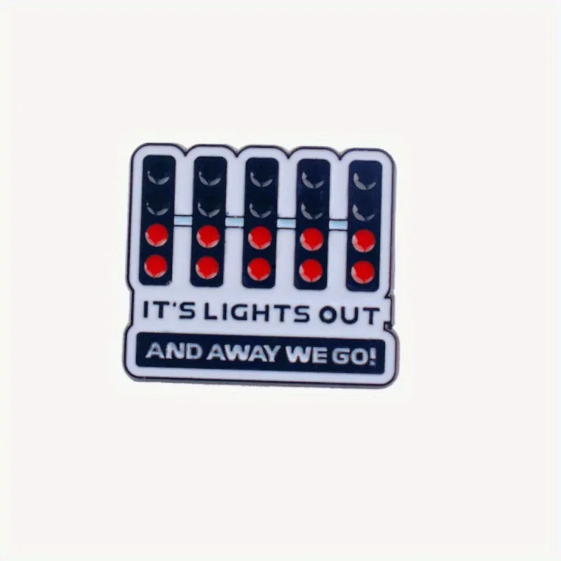 Unique Traffic Light - Shaped Enamel Pin with Bold “IT'S LIGHTS OUT AND AWAY WE GO!” Text - Make a Statement with Your Style