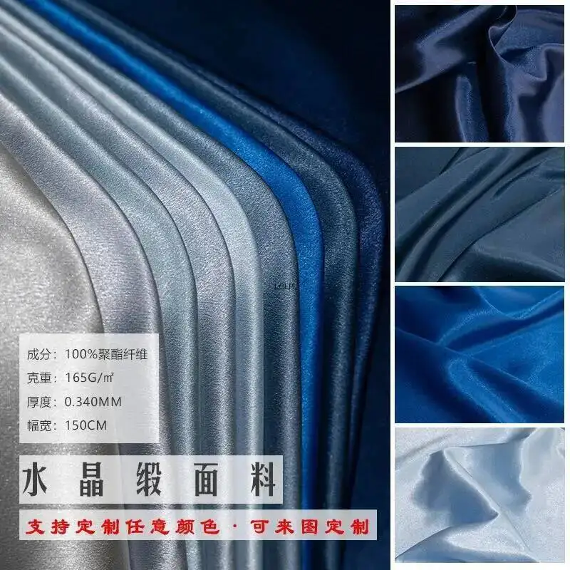 

Blue Crystal Satin Fabric, 100% Polyester, Glossy, Draping, Silky, Suitable For Dress Lining, Designer Fabric