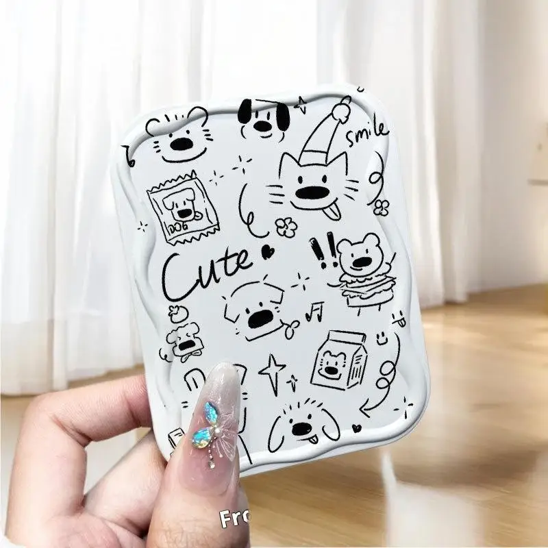 シックな子犬の手鏡と櫛のセット。休日や誕生日に最適な美容アクセサリーギフト。