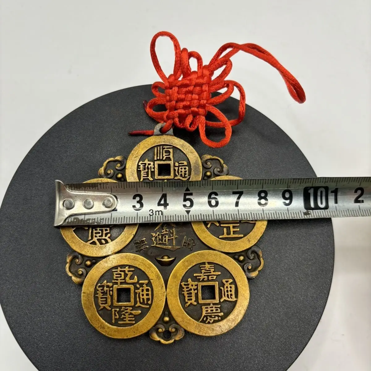 

Pure copper five emperors' money genuine thickened brass five emperors' money presses the threshold, which means that the town h