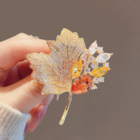 High End Retro Hollowed Out Crystal Brooch For Women With A Sense Of Luxury, High-end Rhinestone Maple Leaf 2025 New Model