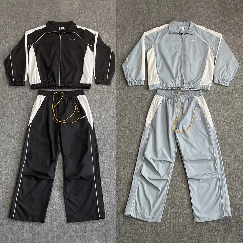

Мужской спортивный костюм с цветными вставками: куртка-ветровка Rhude с вышивкой и брюки на шнурке