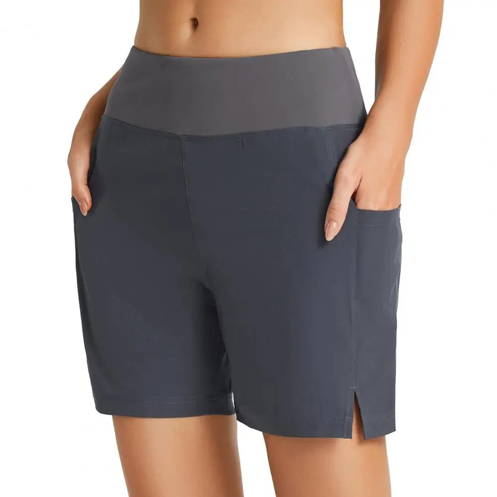 Pantalones cortos deportivos con bolsillos para mujer, Shorts informales de pierna ancha, cintura elástica media, secado rápido, para entrenamiento, correr, ropa de calle