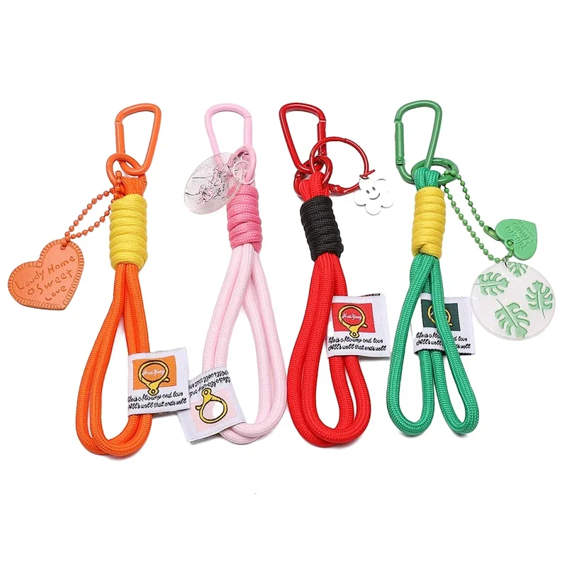 Iridescent braided rope keychain with sturdy carabiner. Stylish bag pendant, great for DIY jewelry crafts.