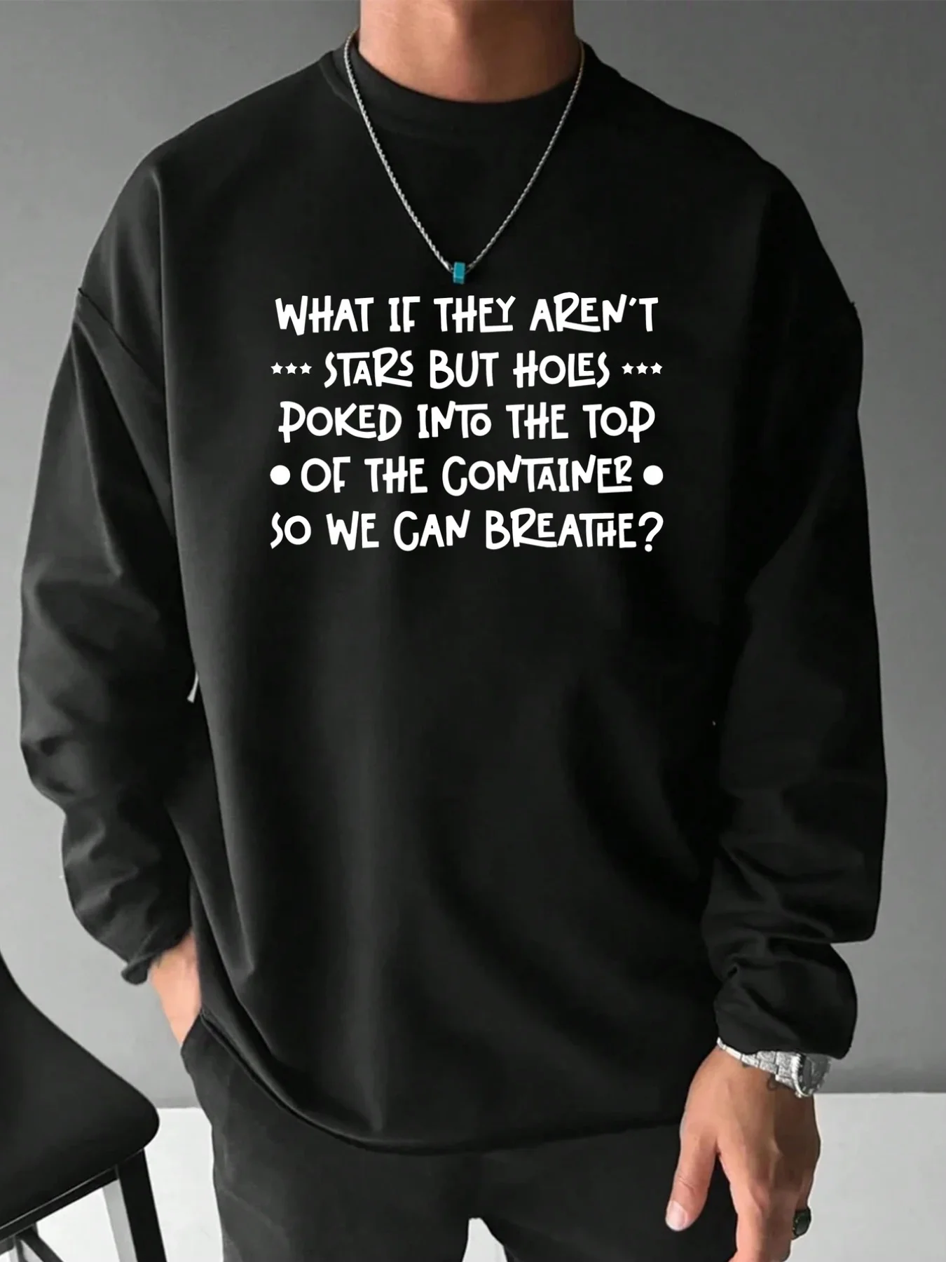 

Men's black round-neck long-sleeved pure cotton T-shirt, with simple and creative text design,and ventilation hole pattern print