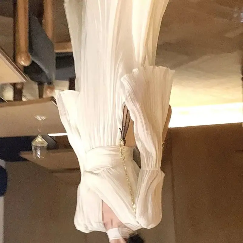 

Goddess Fan White V-Neck Dress Women's 2026 New Early Spring Long Sleeve Coffee Break French High-End Temperament Skirt Women