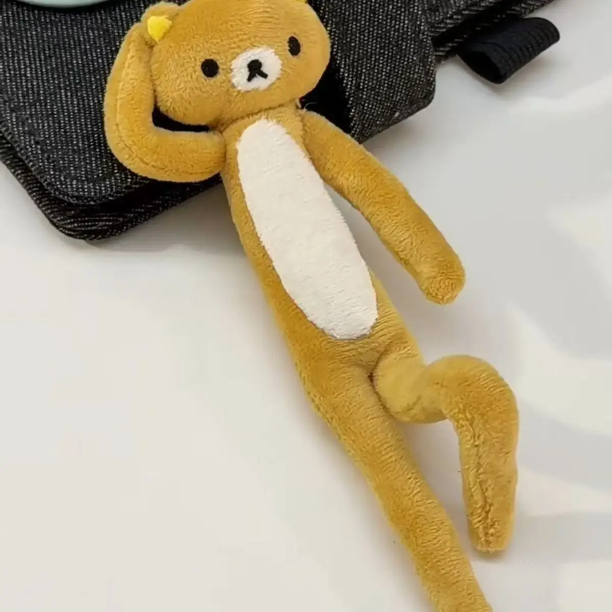 Super cute and easy-to-handle bear with an iron wire frame.It can be made into any long strip of plush bear.Great gift for kids!