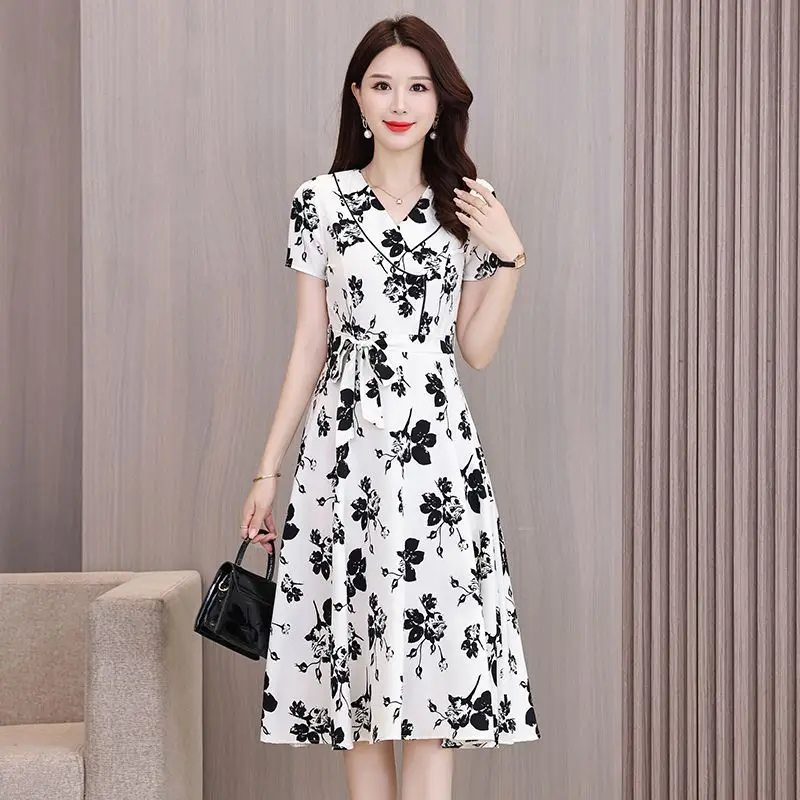 فستان نسائي صيفي ميدي موضة الأزهار طباعة كشكش كاب الأكمام الخامس الرقبة ألف خط Vestidos عادية جاهزة الخصر فستان الشمس الطرف