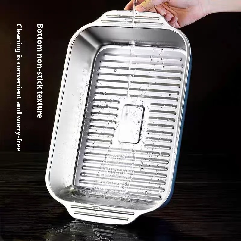 Double-handled stainless steel multi-function fish pot with lid, featuring a striped non-stick bottom, ideal for home kitchens