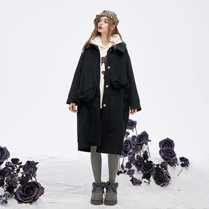 ELFSACK 2025 Winter New Arrivals Minimalist Loose Solid Bow Pocket Button Long Coat For Women