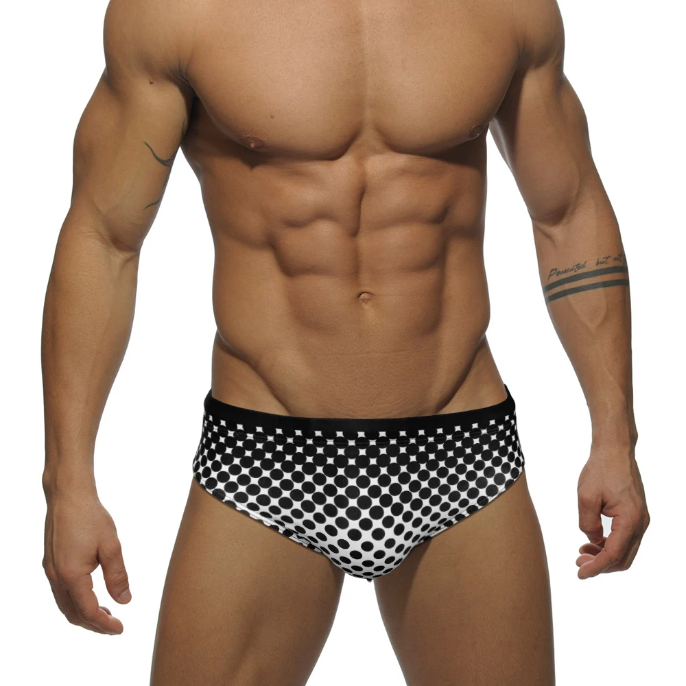 Letnie męskie majtki kąpielowe seksowne nadruk w kropki z niskim stanem strój kąpielowy Bikini sportowe szybkoschnący, oddychający Pad Push Up plażowe kąpielówki do surfingu