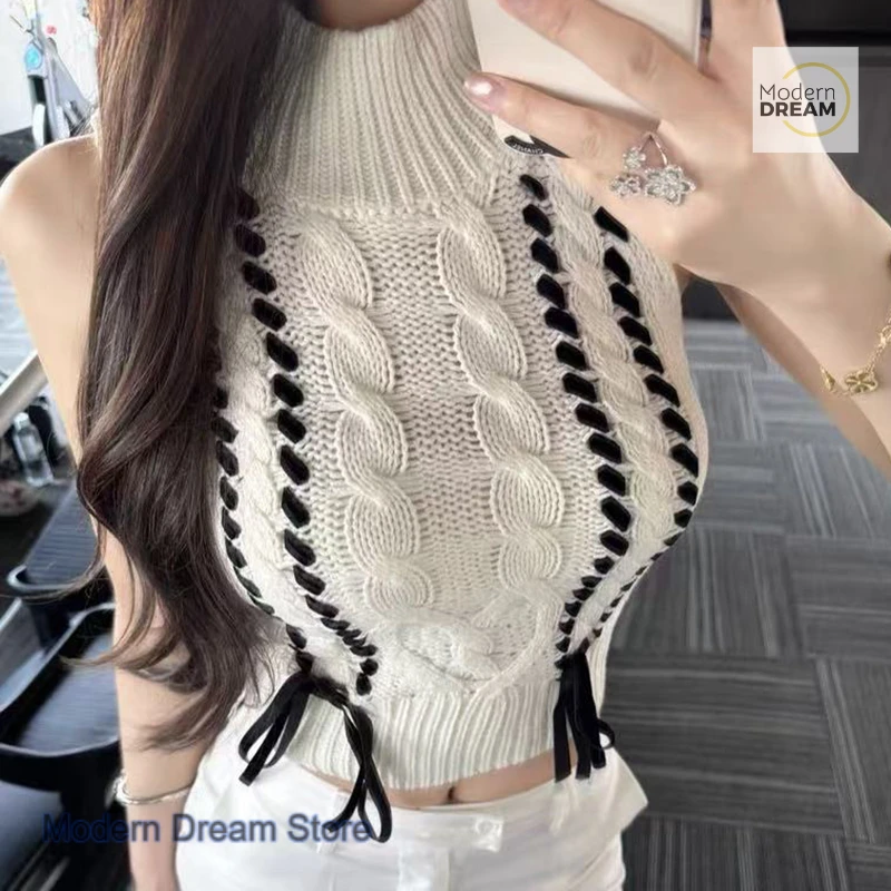 Gilet lavorato a maglia a collo mezzo alto da ragazza speziata dolce in stile coreano, design di nicchia autunnale e invernale da donna con top senza maniche con fiocco.